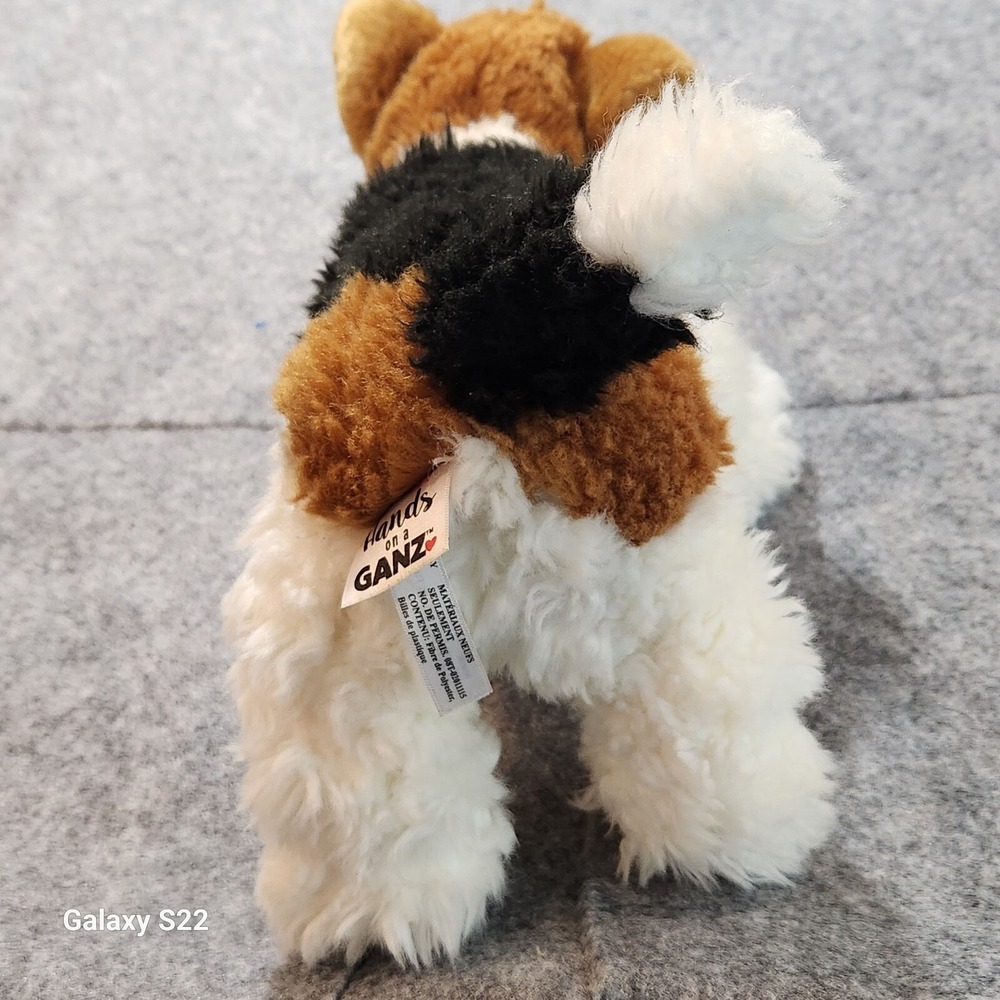 Hands on a Ganz Plush Dog Tricolor Terrier Stuffed Animal White Brown Black - Picture 7 of 11